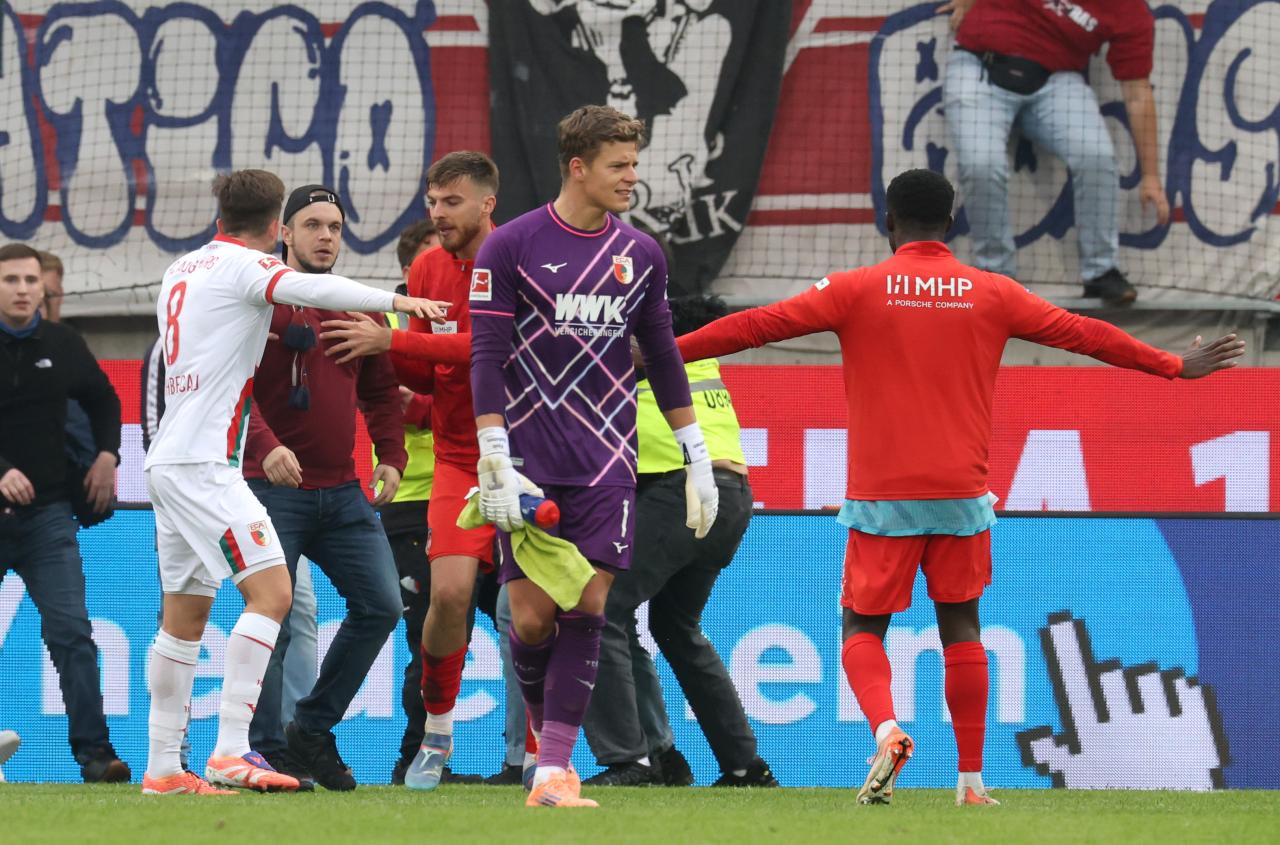 Angry Heidenheim fans chase Augsburg players after supporter’s serious fall
