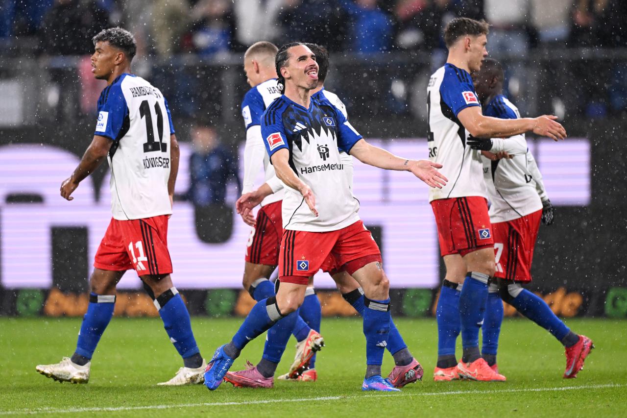 Rain and goals pour down as Hamburg sweep aside Mainz