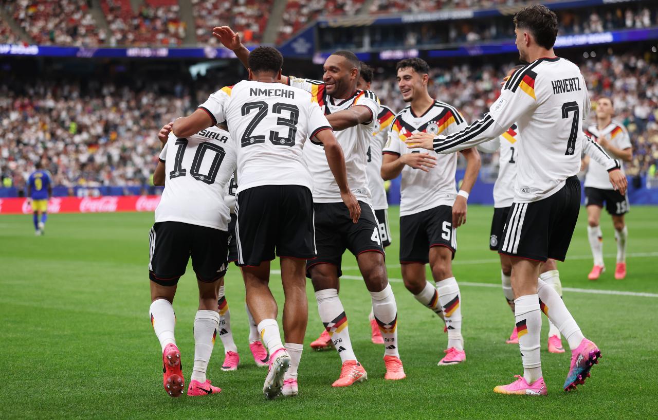 Germany recover from first half stumble to hit seven past Curaçao
