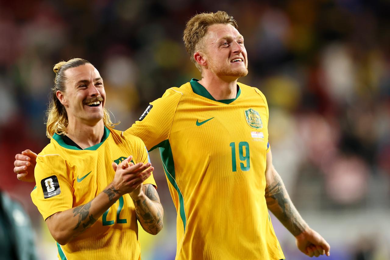 World Cup: St. Pauli duo help Australia progress, Paraguay set to face Germany