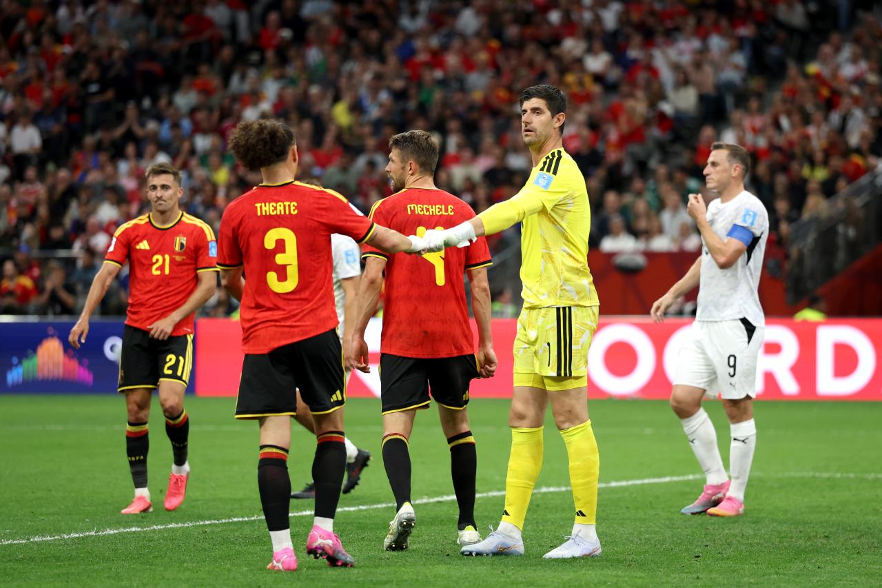 World Cup: Belgium and Egypt progress from Group G as Iran face anxious wait