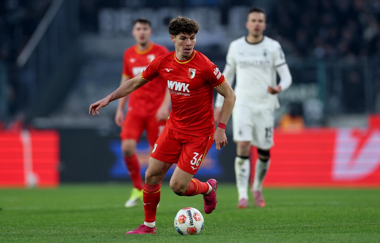 Augsburg boss Benjamin Weber confirms “big market” interest in Kömür and Claude-Maurice amid exit talk
