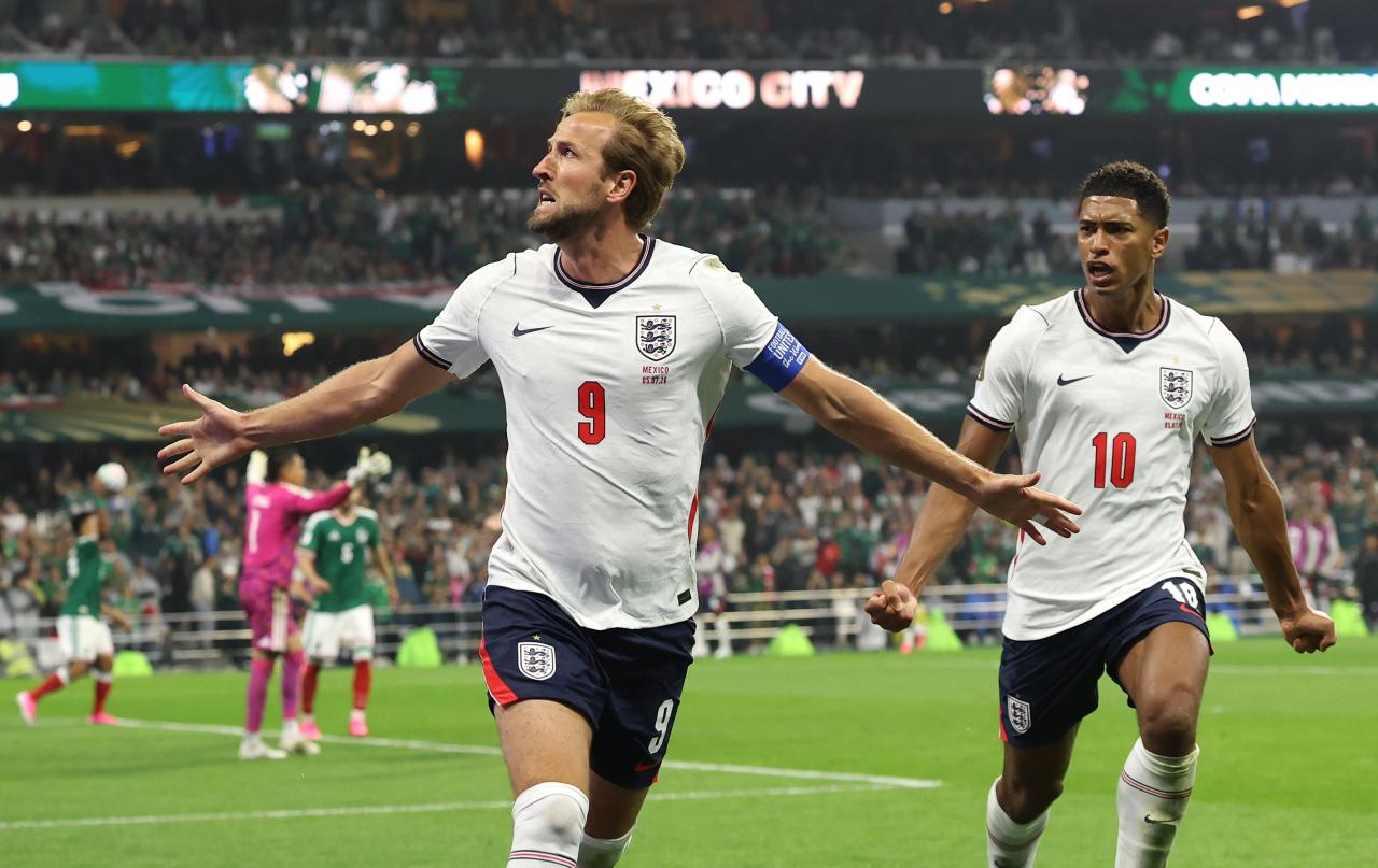 World Cup: Bellingham and Kane send ten-man England through with tough win over Mexico