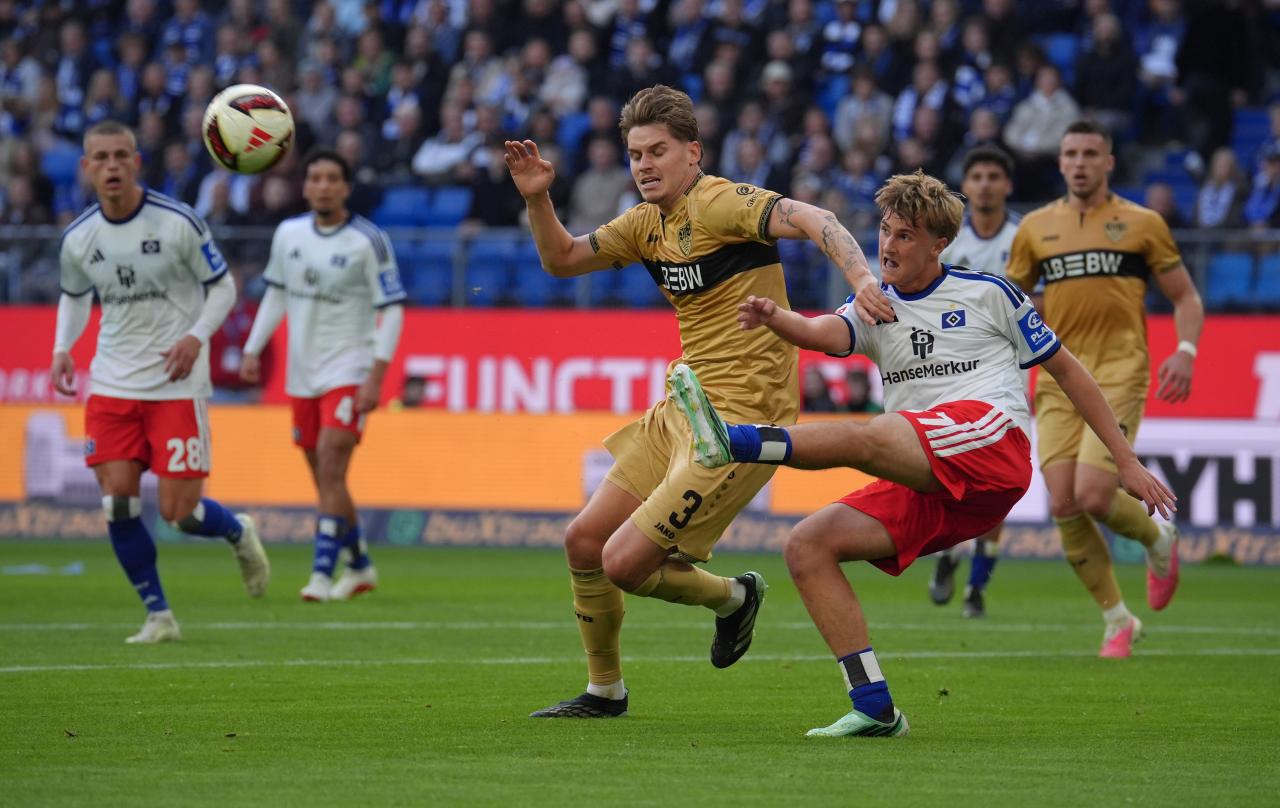 Miro Muheim celebrates after scoring for Hamburg against Stuttgart