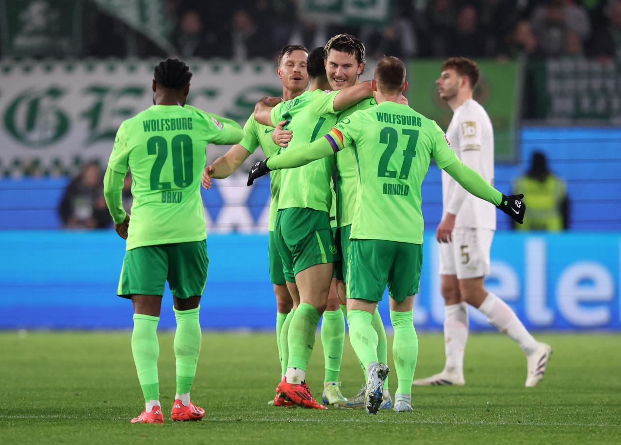 Wind the hero as Wolfsburg edge out Mainz in seven-goal thriller