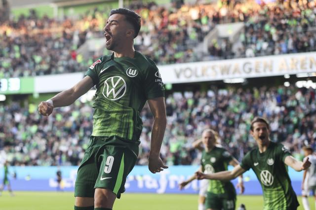VfL Wolfsburg forward Mohamed Amoura celebrates after a Hoffenheim own goal, 9 May 2025.