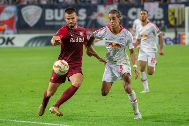RB Leipzig's Yussuf Poulsen (right) scored a hat-trick against Hertha BSC.