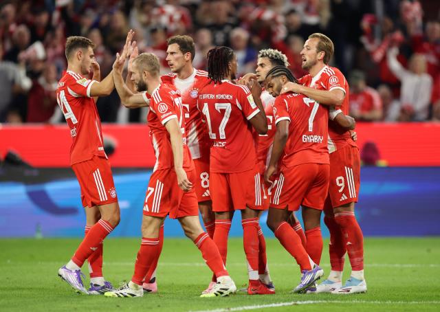 Bayern Munich players celebrating against RB Leipzig.