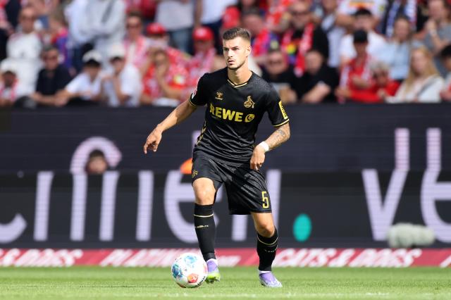 Tom Krauß of FC Köln controls the ball against Mainz