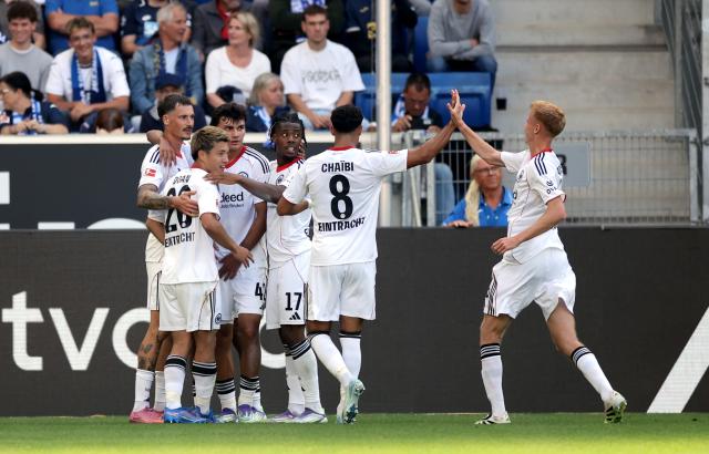 Eintracht Frankfurt forward Ritsu Dōan celebrates the opening goal with his teammates, 30. August 2025.