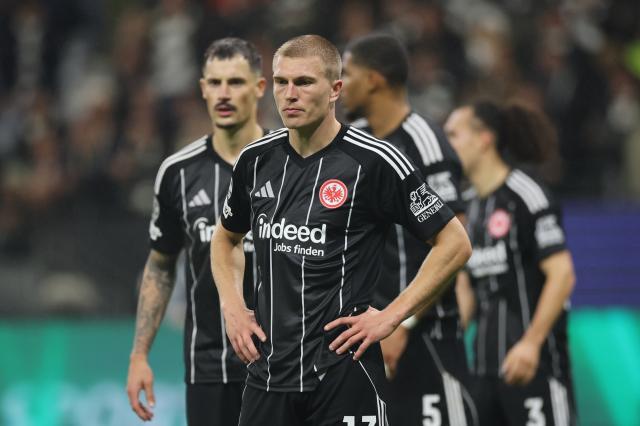 Eintracht Frankfurt players after the loss against Liverpool.