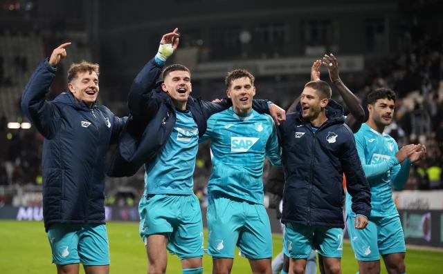 TSG Hoffenheim players celebrate following their win against FC St. Pauli.