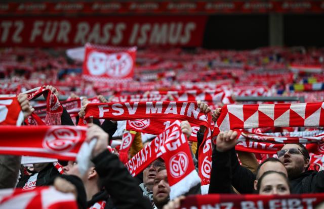 Fans of Mainz enjoy the atmosphere prior to the Bundesliga match vs Werder Bremen