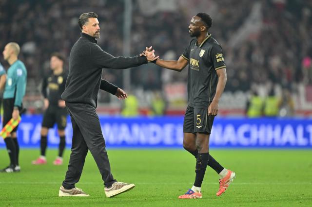 FCA coach Sandro Wagner and FCA defender Chrislain Matsima.