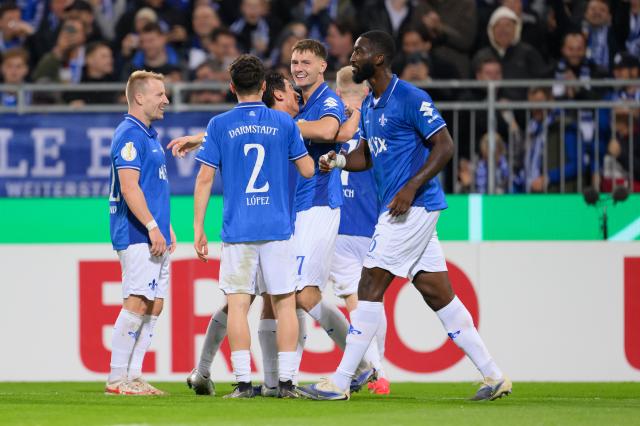 SV Darmstadt 98 celebrate their fourth goal during the DFB Pokal match vs. FC Schalke 04