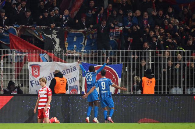 Heidenheim celebrating after their late win.