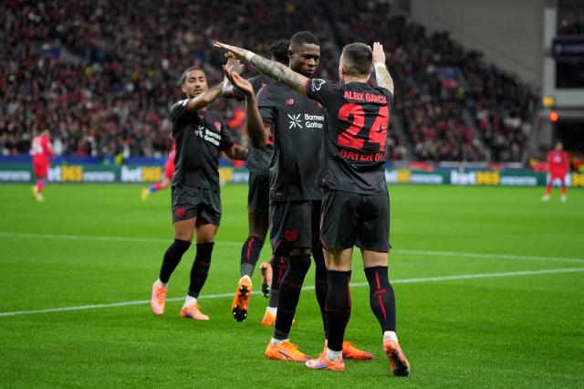 Kofane celebrating a goal with Aleix Garcia.
