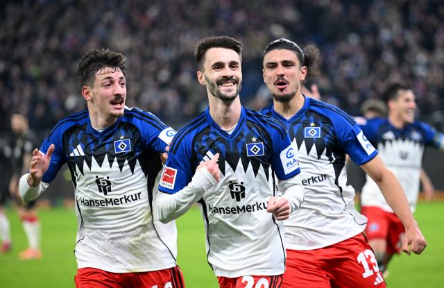 Fabio Vieira of Hamburger SV celebrates scoring his team's second goal vs. Stuttgart with teammates, Nov 30 2025