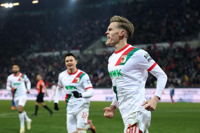 Anton Kade of Augsburg celebrates scoring his team's first goal during the Bundesliga match vs. HSV