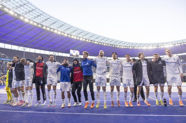 Players of Magdeburg celebrate after winning the 2. Bundesliga match vs. Hertha BSC