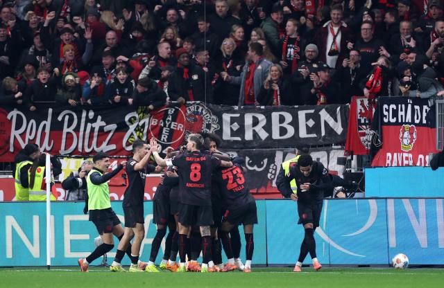 Leverkusen players celebrating.