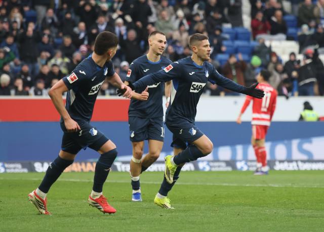 Hoffenheim players celebrating.