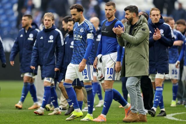 Miron Muslic, Kenan Karaman and Edin Dzeko of Schalke 04 