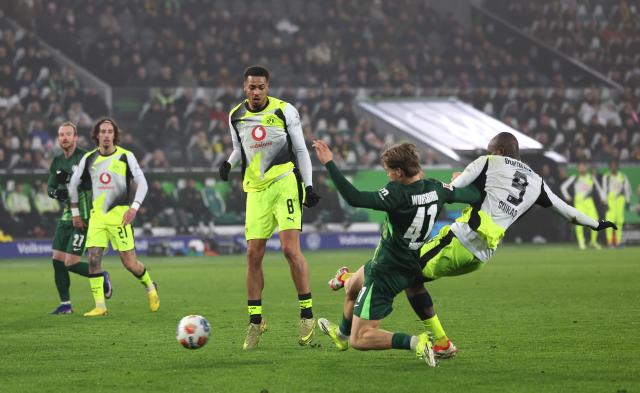 Serhou Guirassy taps his eighty-seventh minute goal past Jan Bürger to win the match for Borussia Dortmund, 7. February 2026.