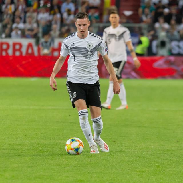 Julian Draxler wore the captain's armband. 