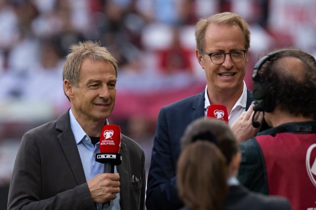 Jürgen Klinsmann (left).