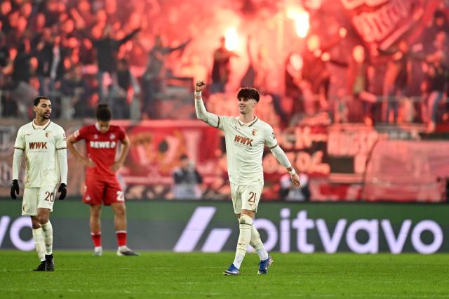 Augsburg's Ribeiro celebrates his goal against Köln.