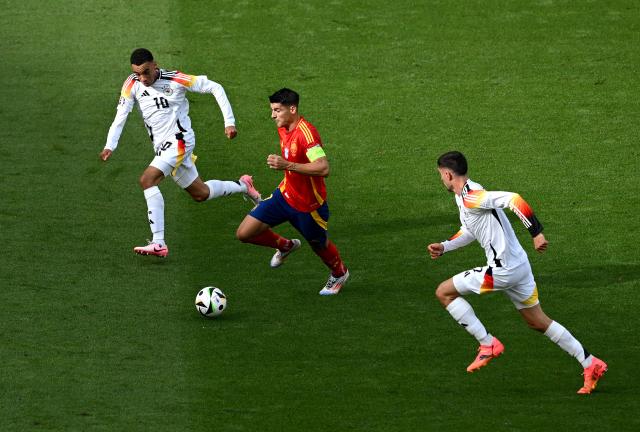 Havertz and Musiala chasing Morata in home Euros