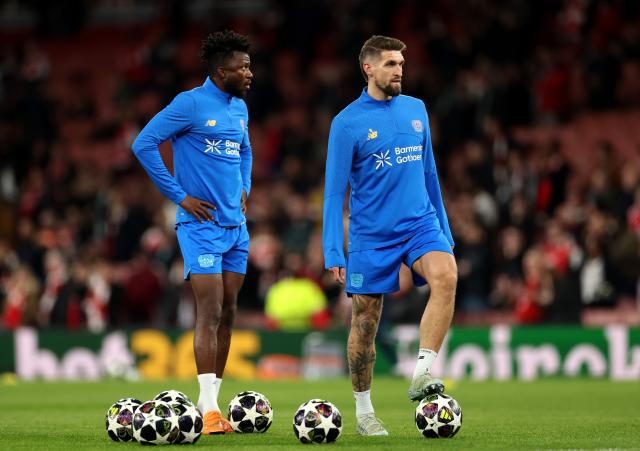 Andrich and Tapsoba ahead of kick-off against Arsenal.