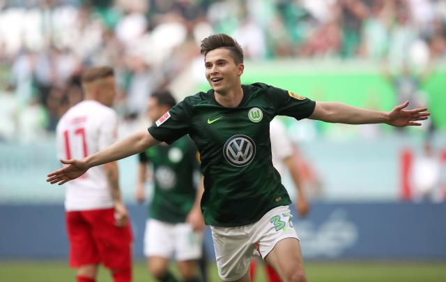 VfL Wolfsburg defensive midfielder Elvis Rexhbeçaj celebrates scoring against FC Augsburg, 18. May 2019.