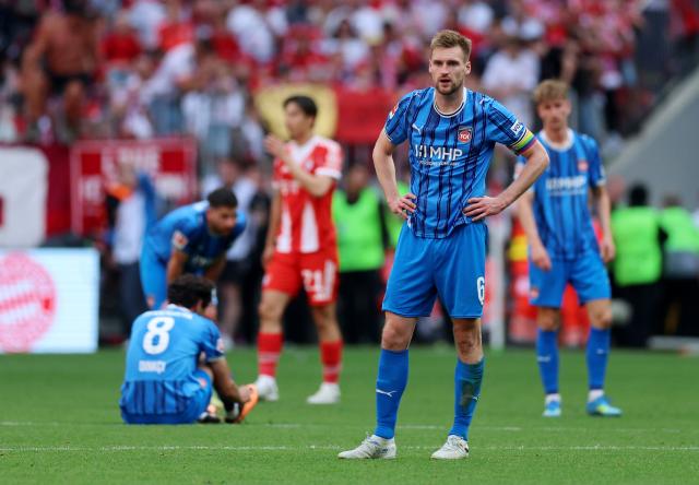 Heidenheim players in disbelief.