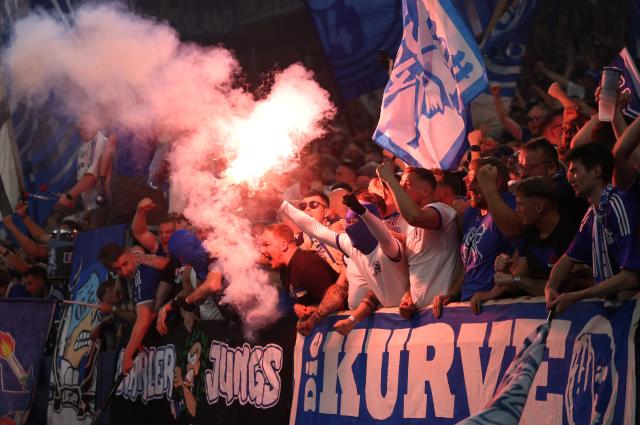 Schalke fans celebrate with their team on their way to promotion 