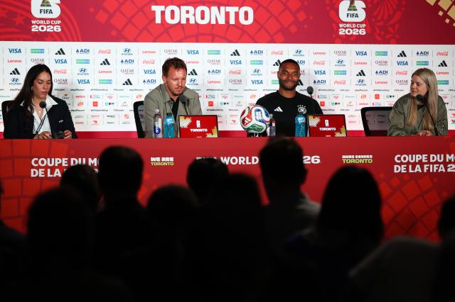 Julian Nagelsmann and Jonathan Tah at the press conference.