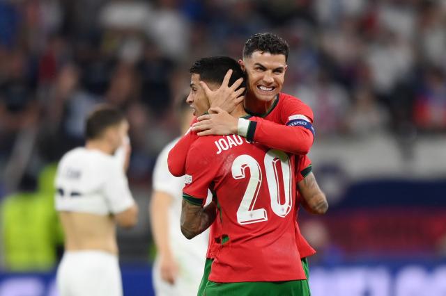 Ronaldo and Cancelo for Portugal.