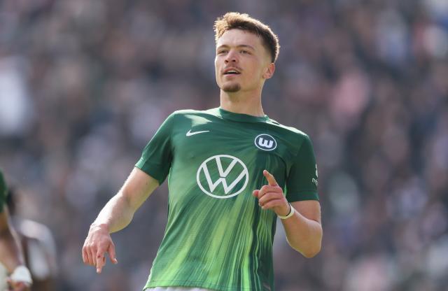 Wolfsburg striker Dzenan Pejcinovic celebrates scoring against St. Pauli at Millerntor Stadion on 16 May 2026. 