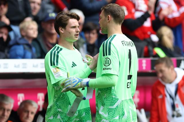 Jonas Urbig and Manuel Neuer.