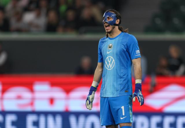 VfL Wolfsburg goalkeeper Kamil Grabara during the first leg of the promotion-relegation playoff against SC Paderborn 07, 21. May 2026.