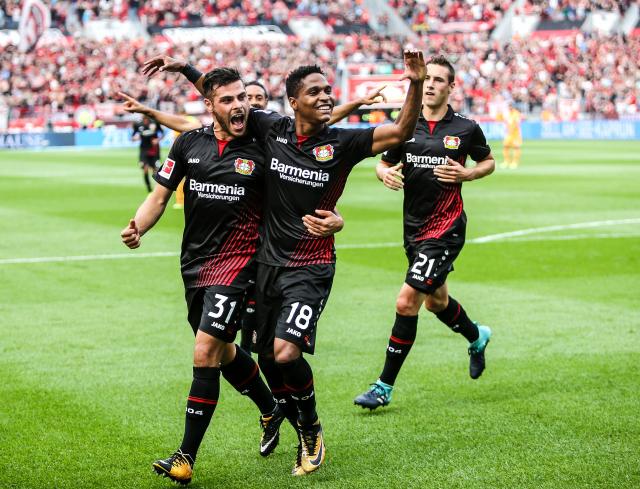 Kevin Volland (left) celebrates with Wendell (right).