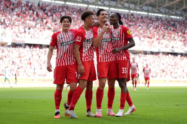 Freiburg players celebrating.