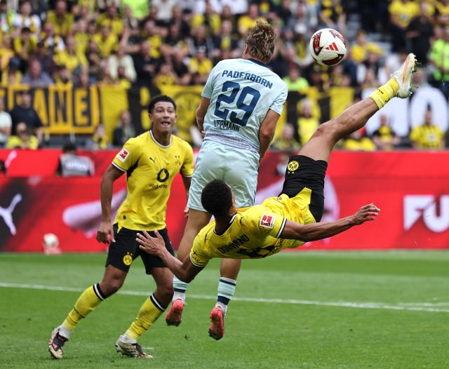 Felix Nmecha scores with an overhead kick for Borussia Dortmund vs SC Paderborn.