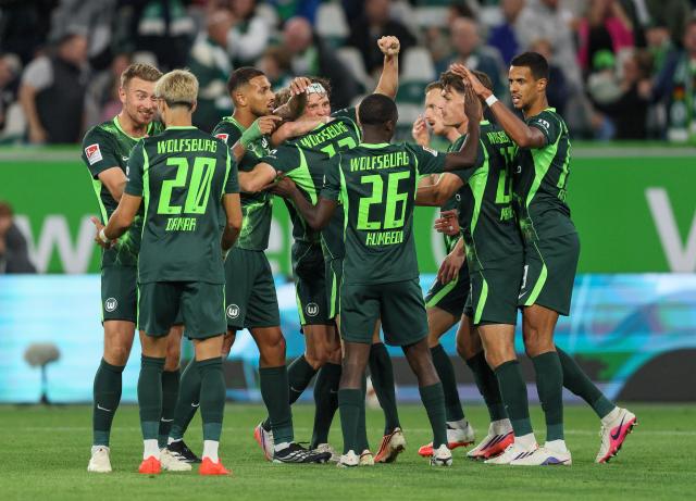 VfL Wolfsburg players celebrate Alexander Bernhardsson's second goal against SV Darmstadt 98, 18. September 2026.