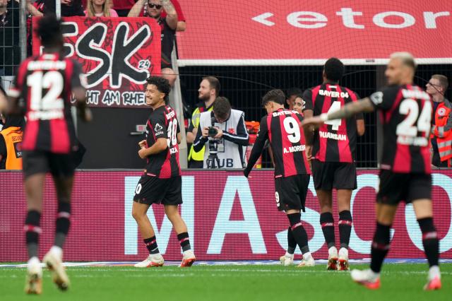 Leverkusen players celebrating.