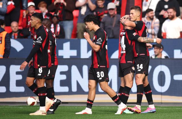 Leverkusen players celebrating.