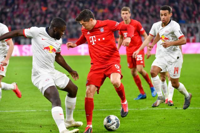 Dayot Upamecano (RB Leipzig) and Robert Lewandowski (Bayern München).