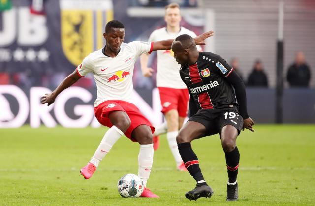 Moussa Diaby (right) scored a hat-trick for Leverkusen.