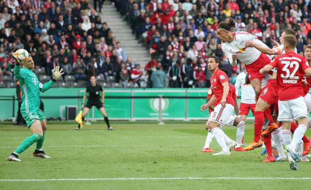 Manuel Neuer saving a header from Yussuf Poulsen.